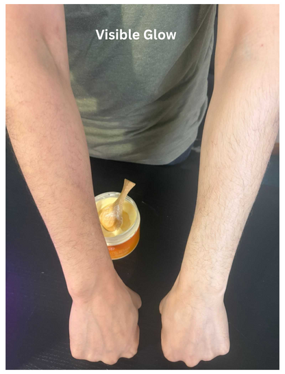 Person applying a product to their arm with 'Visible Glow' text above.